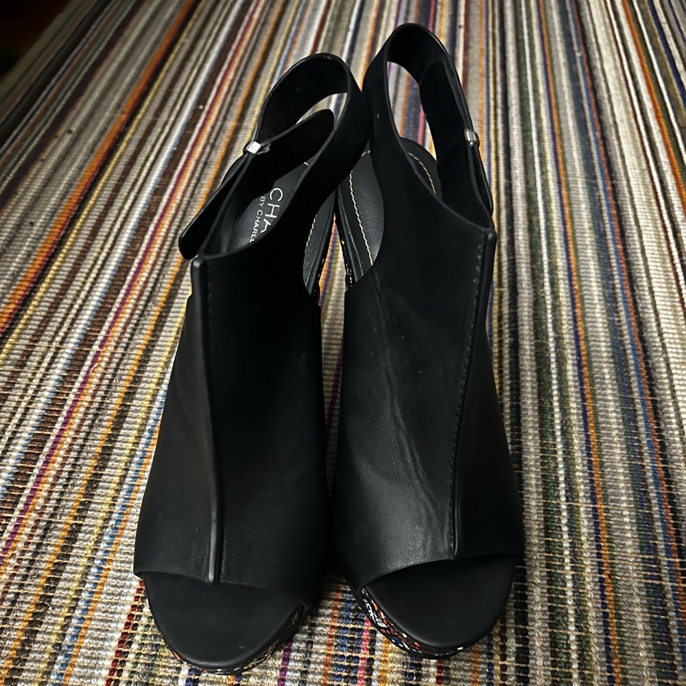 Multi color and black leather wedges.